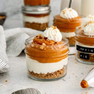 Recipe card photo for layered pumpkin pie in a jar.