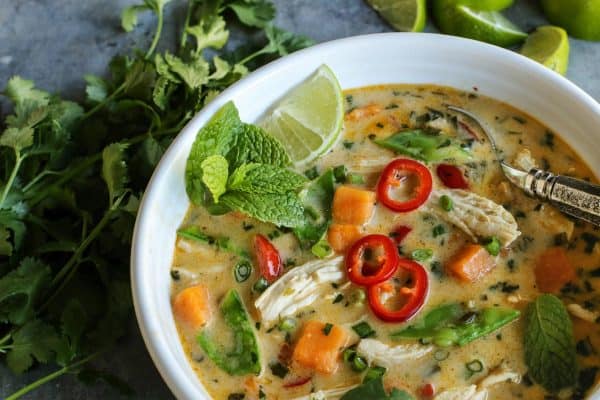 Chicken Soup with Thai flavors, fresh mint and lime wedges