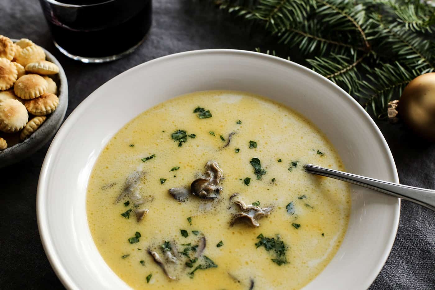 Easy oster stew in a white bowl with oyster crackers to the side