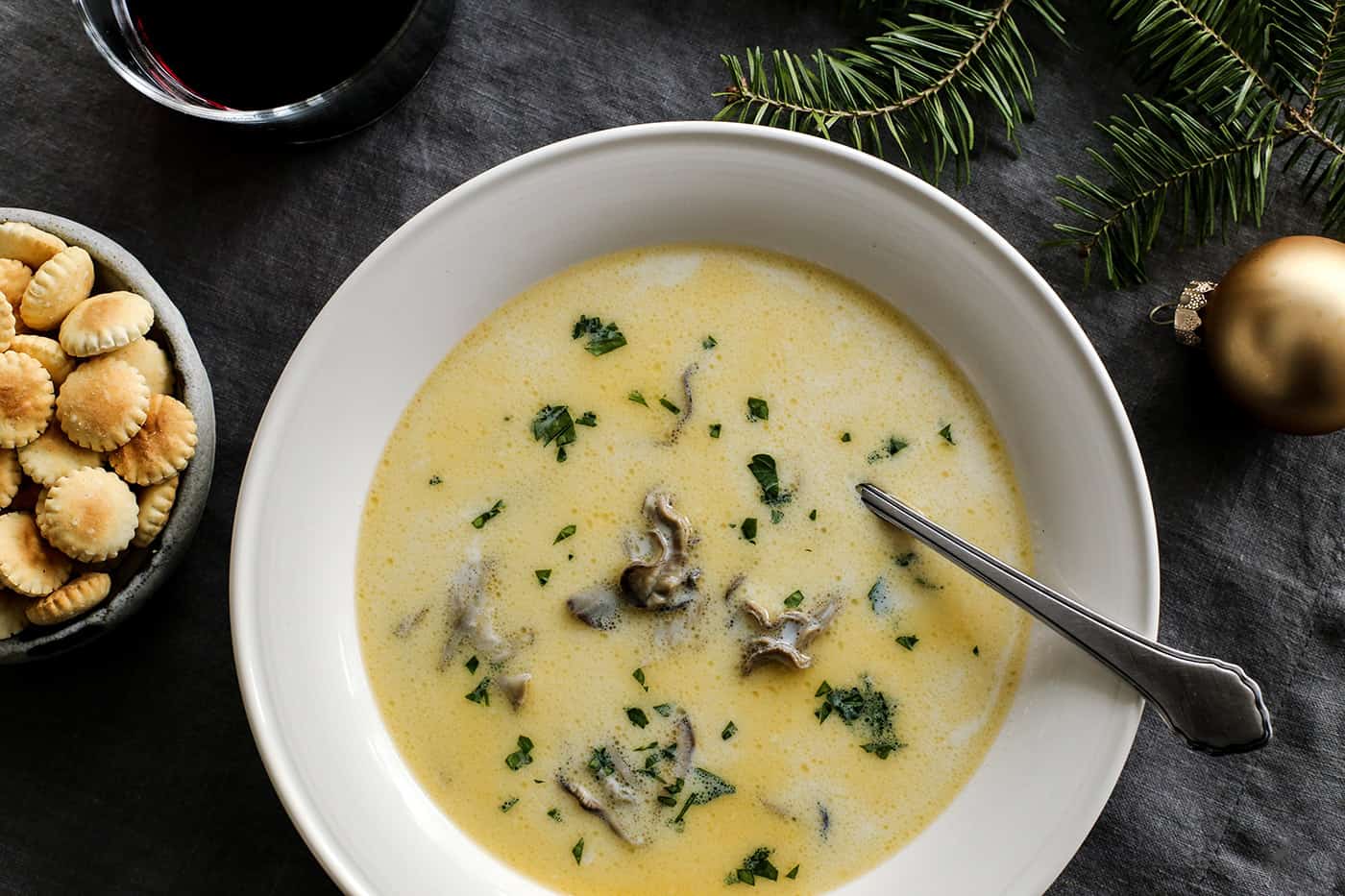 Overhead view oyster stew in a whitebowl