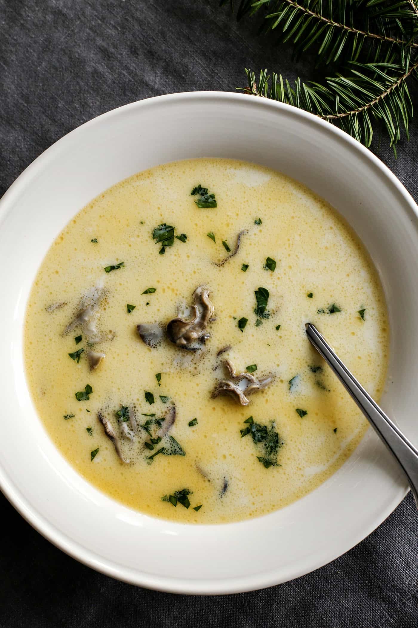 A white bowl of oyster stew