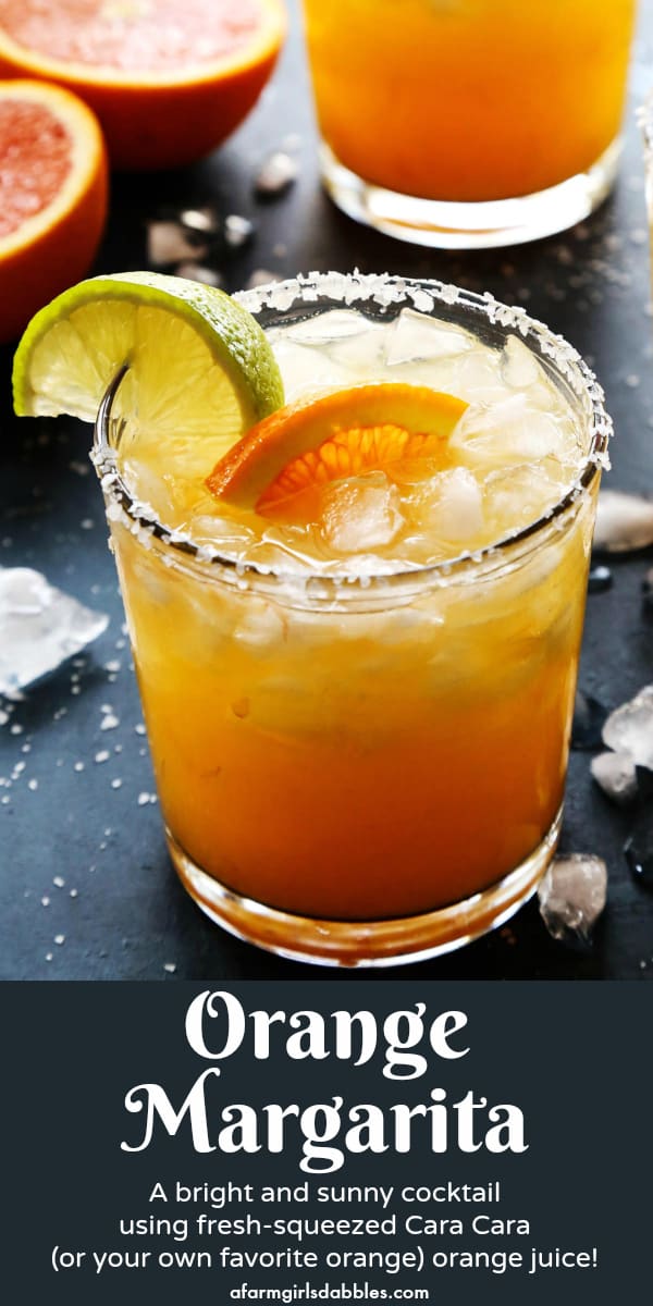 pinterest image of orange margarita in a salt-rimmed glass, with fresh orange halves