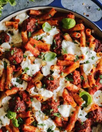 Meatball Baked Ziti in a blue casserole dish