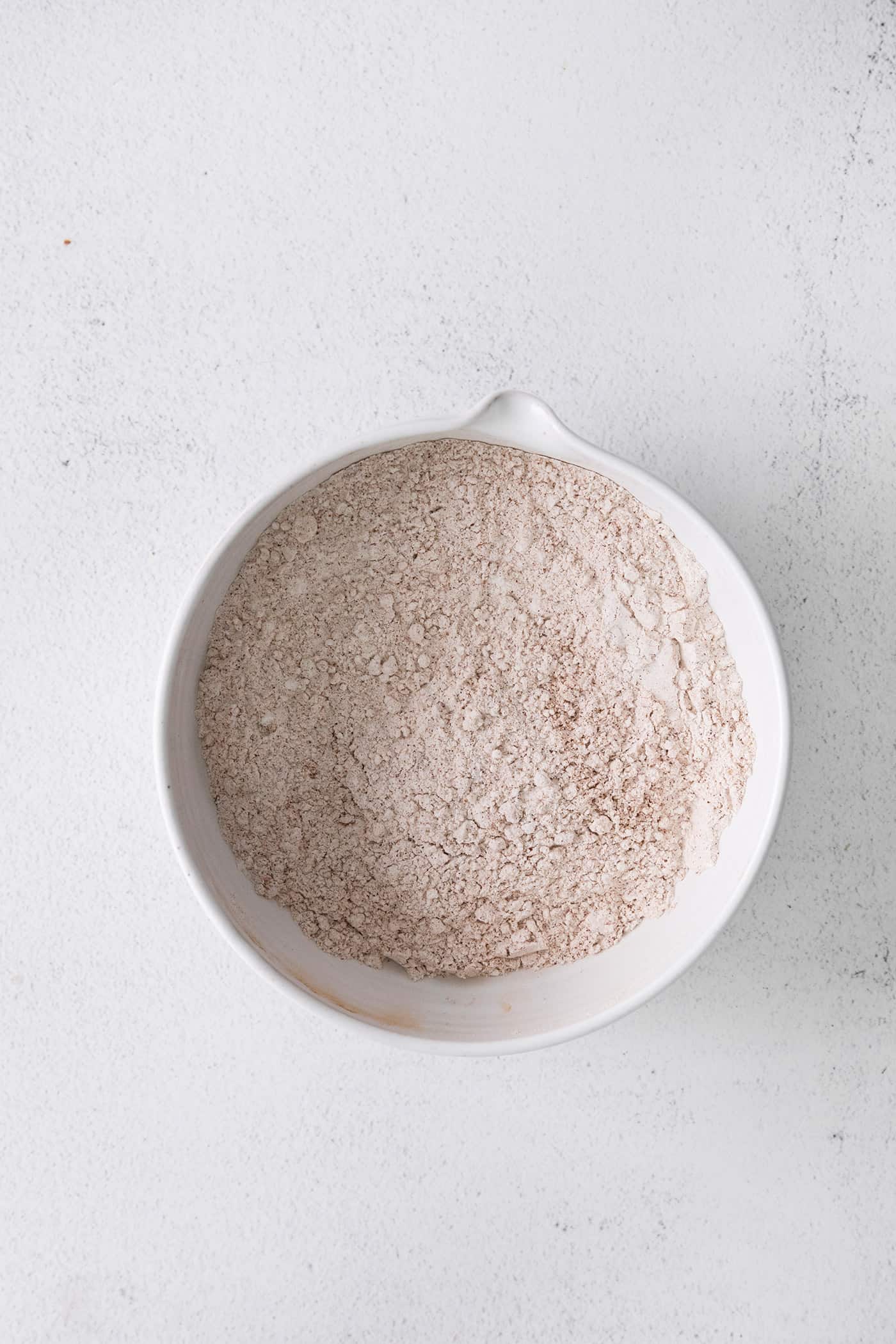 Dry cake ingredients in a mixing bowl