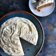 Carrot Cake with a slice taken out on a separate plate