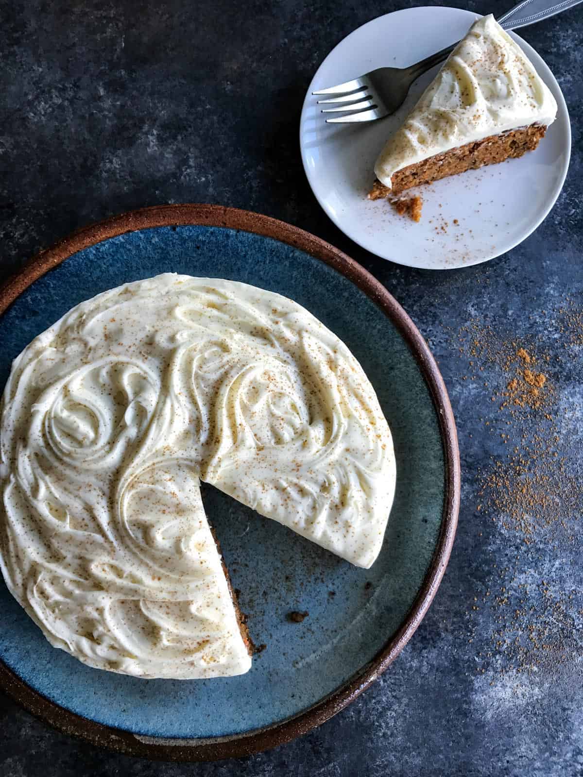 Carrot Cake with a slice taken out on a separate plate