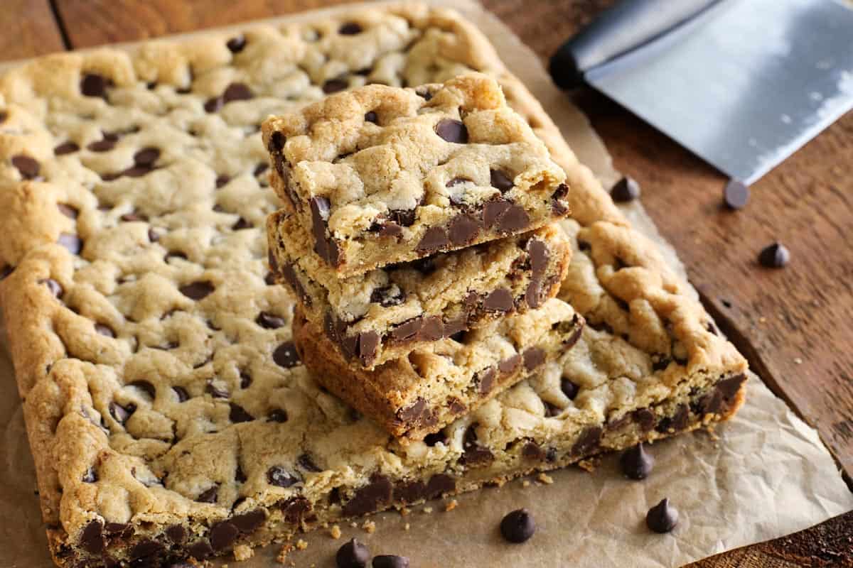 chocolate chip cookie bars being cut