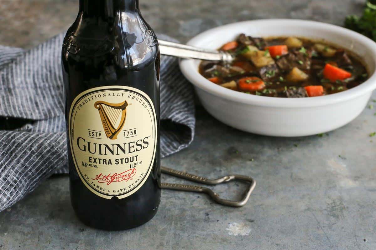 Guinness Extra Stout with a bowl of  Irish Beef Stew 