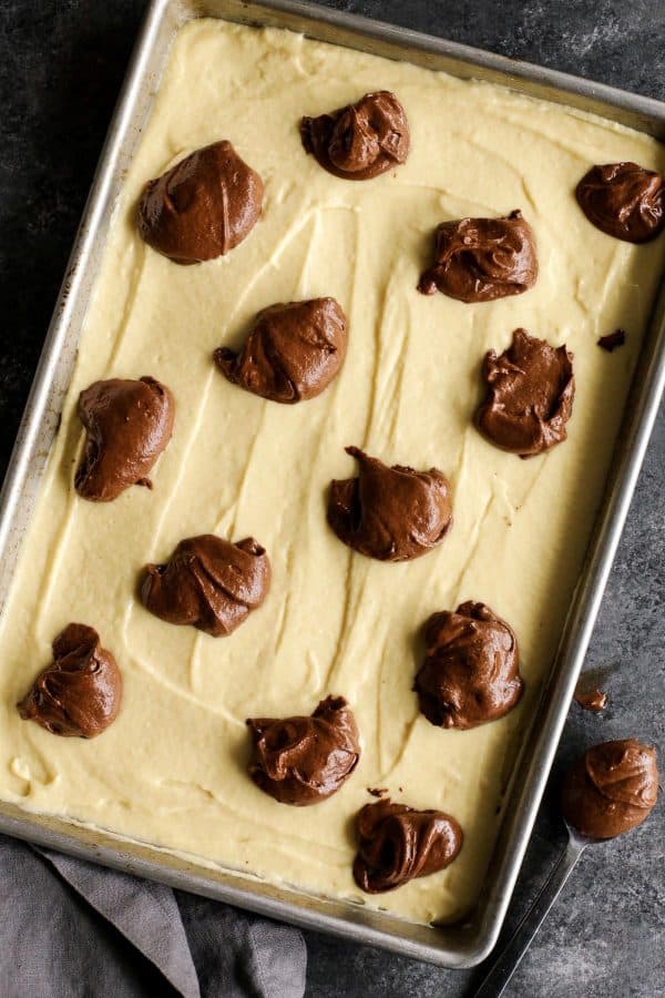 marble cake being assembled before baking