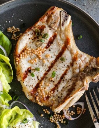 grilled pork chop on a plate