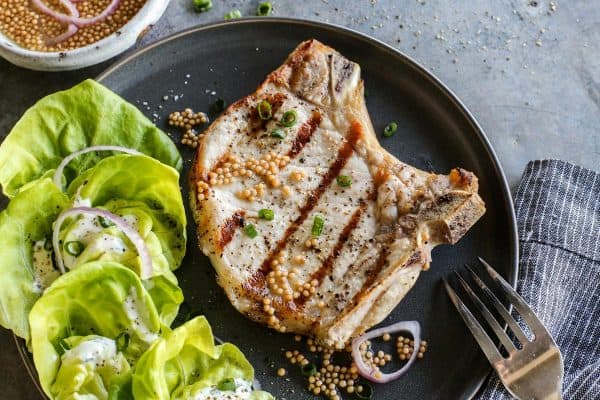 grilled pork chop on a plate