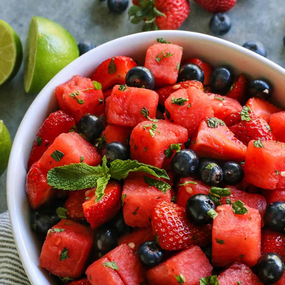 watermelon, strawberries, blueberries in a bowl