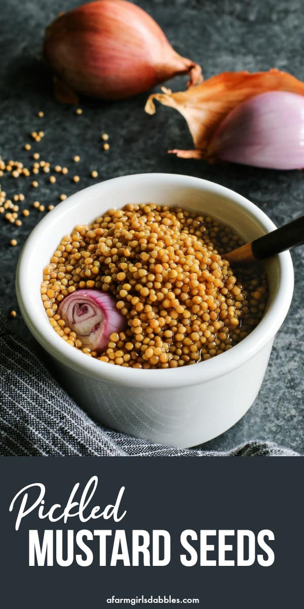 pinterest image of a dish of pickled mustard seeds