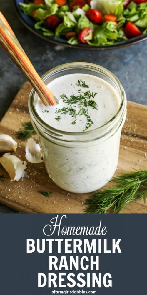 pinterest image of homemade buttermilk ranch dressing in a jar with a wood serving spoon