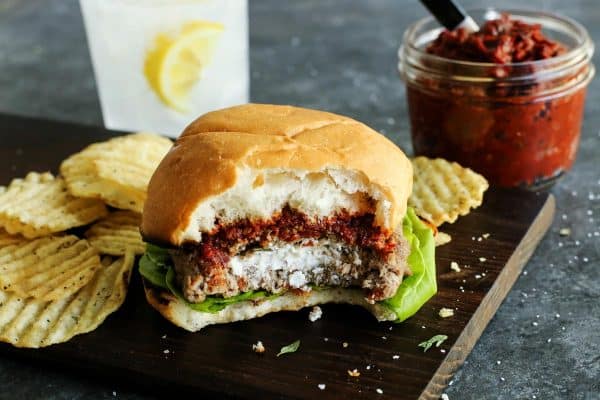 Goat Cheese Stuffed Turkey Burger with a bite taken out