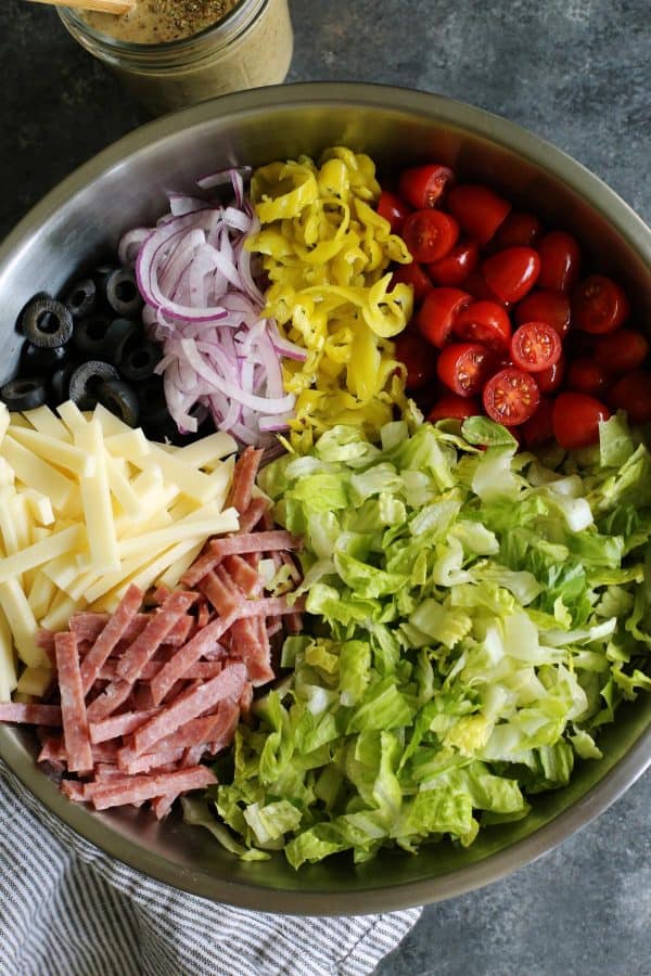 Italian chopped salad ingredients in a bowl