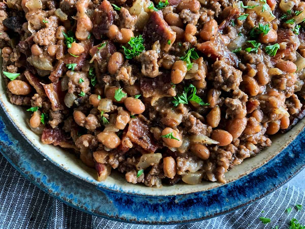 dish of baked beans with bacon and ground beef