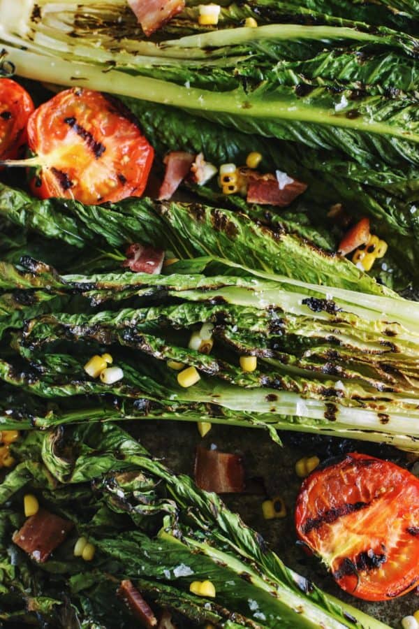 grilled romaine lettuce, tomatoes, and sweet corn, with bacon crumbles