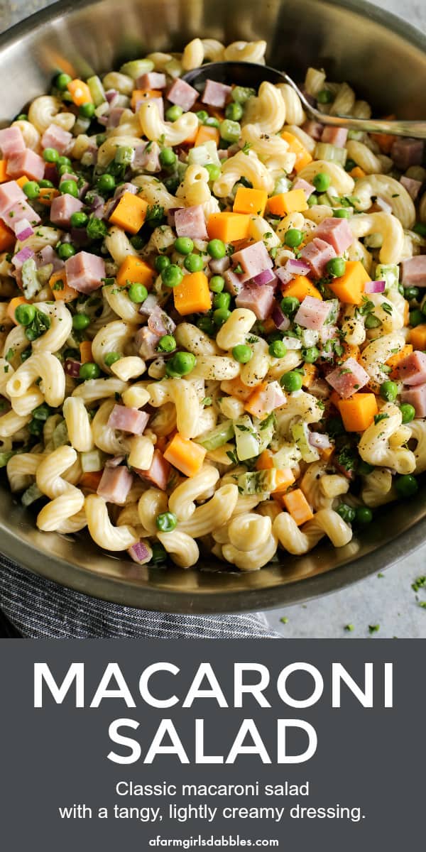 pinterest image of macaroni salad with ham and cheese in stainless steel bowl
