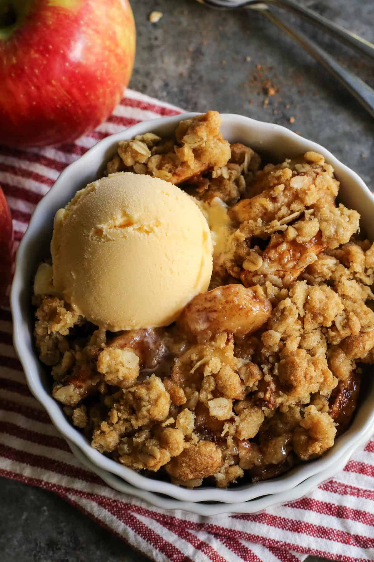 Top view of an old fashioned apple crisp in a ramekin