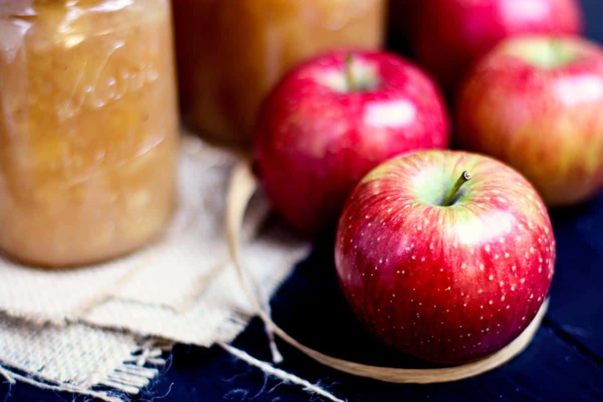 Haralson apples and jars of homemade applesauce