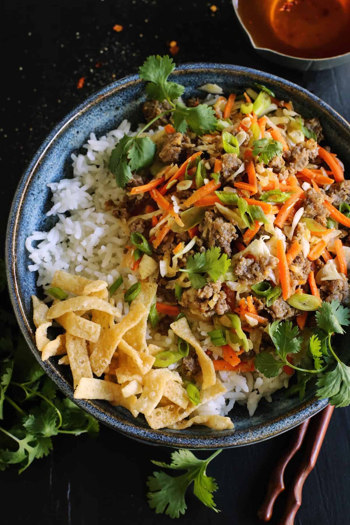 egg roll in a bowl recipe, with ground pork, cabbage, and carrots