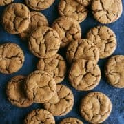 ginger molasses cookies on a dark blue background