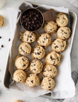 Overhead view of scoops of edible chocolate chip cookie dough on a tray