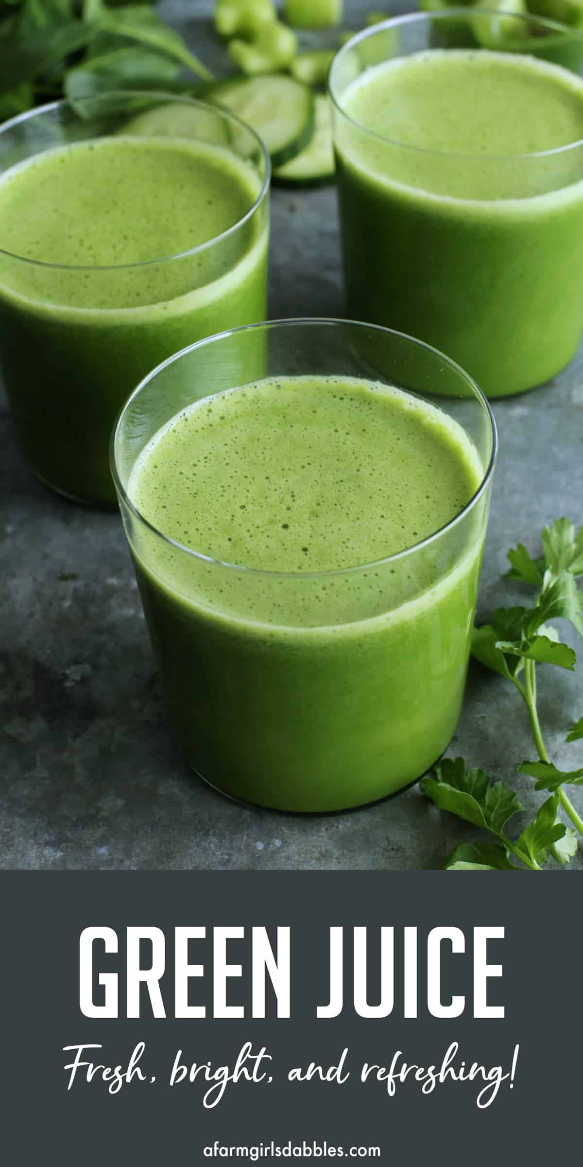 pinterest image of three glasses of green juice, plus fresh spinach, cucumbers, celery, green pepper, and parsley