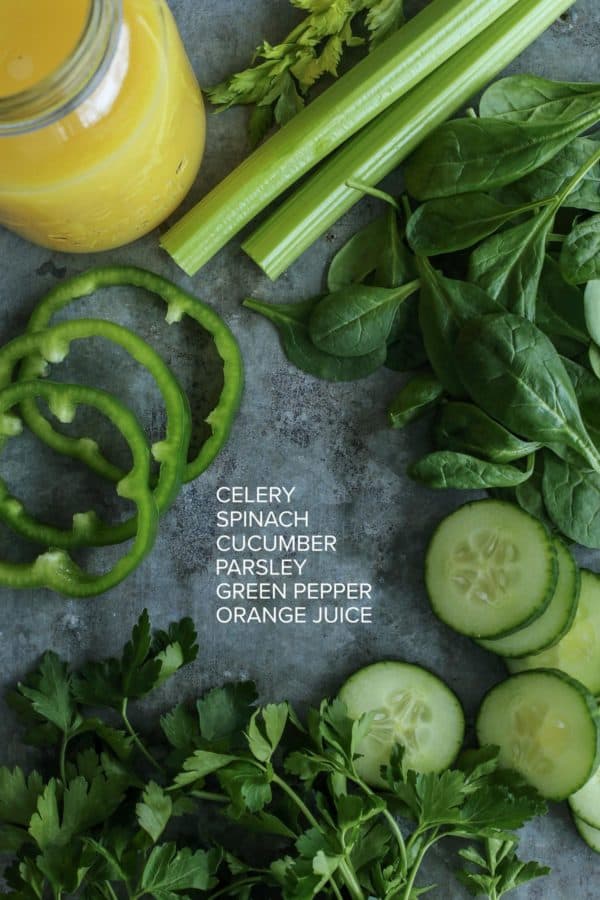 ingredients for green juice include celery, spinach, cucumbers, parsley, green bell pepper, and orange juice