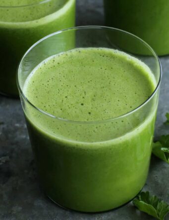 glasses of green juice, plus fresh parsley