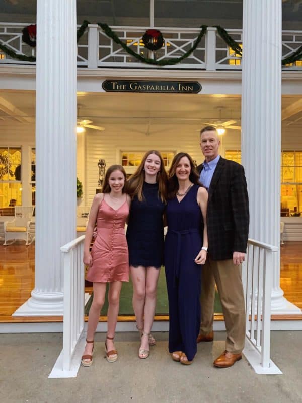 a photo of our family on the porch of Gasparilla Inn in Florida