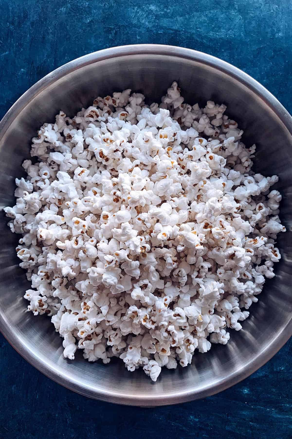 popcorn in large stainless steel bowl