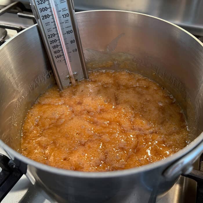 Hot toffee liquid mixture in a saucepan