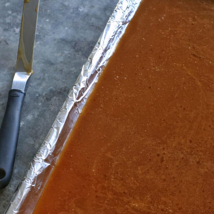 Homemade toffee in a foil-lined pan