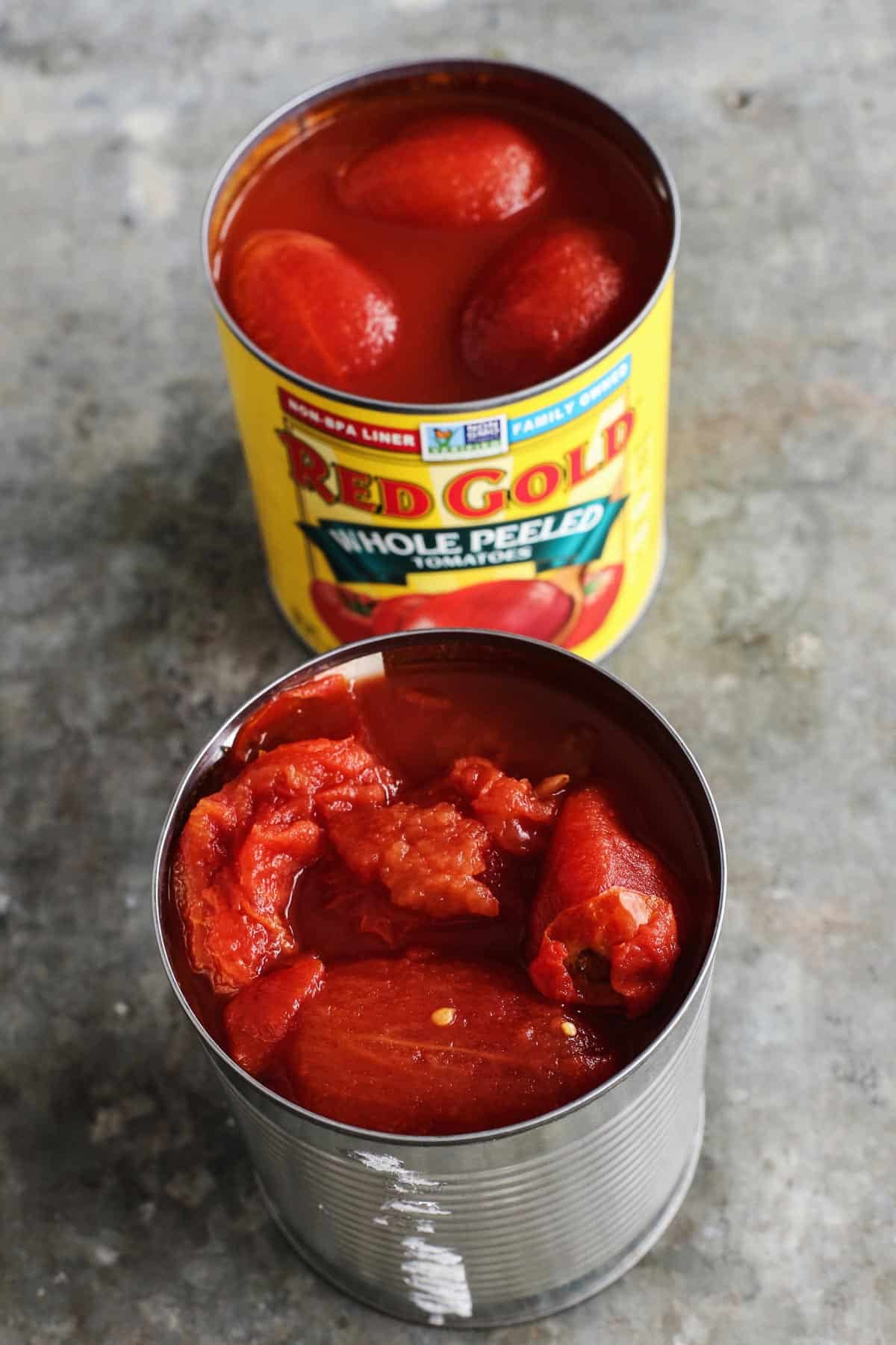two cans of whole peeled tomatoes