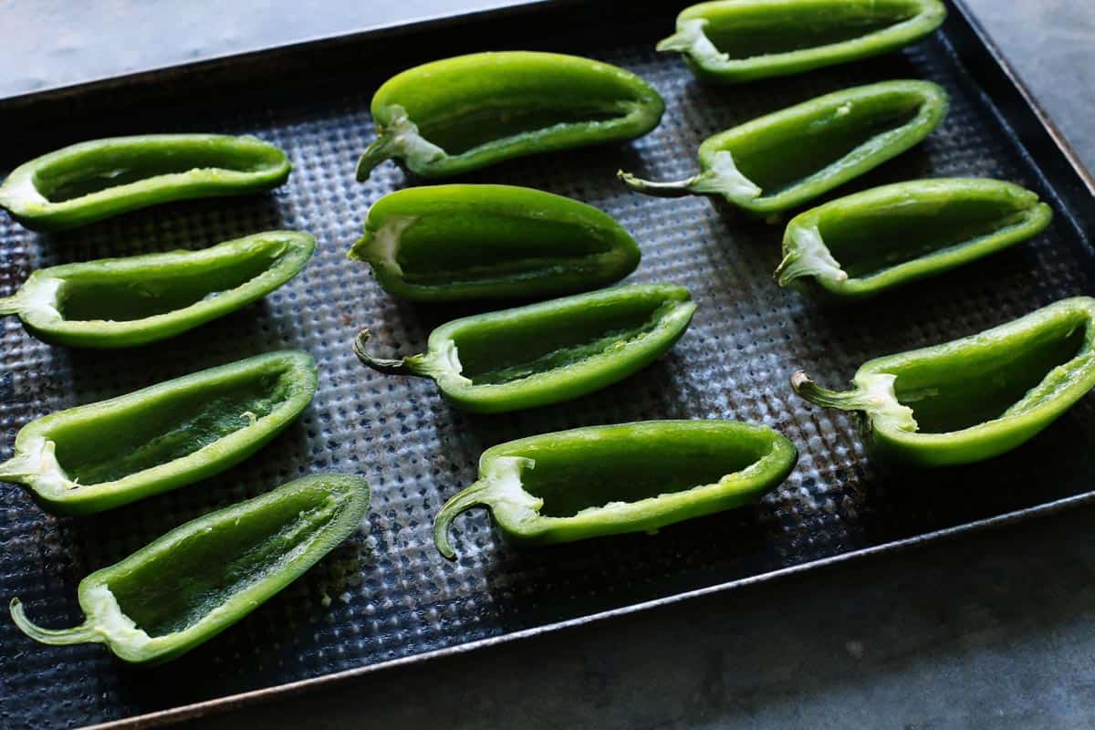 jalapeno pepper halves on a pan