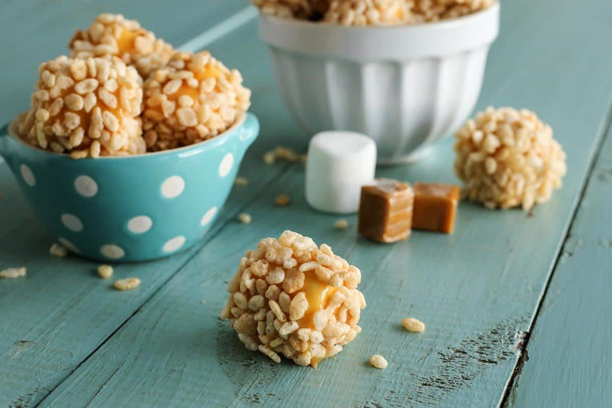marshmallows covered with caramel and rice krispies