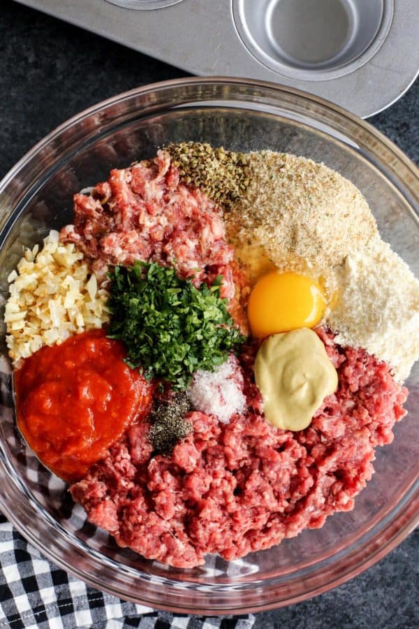 Meatloaf ingredients in a clear bowl