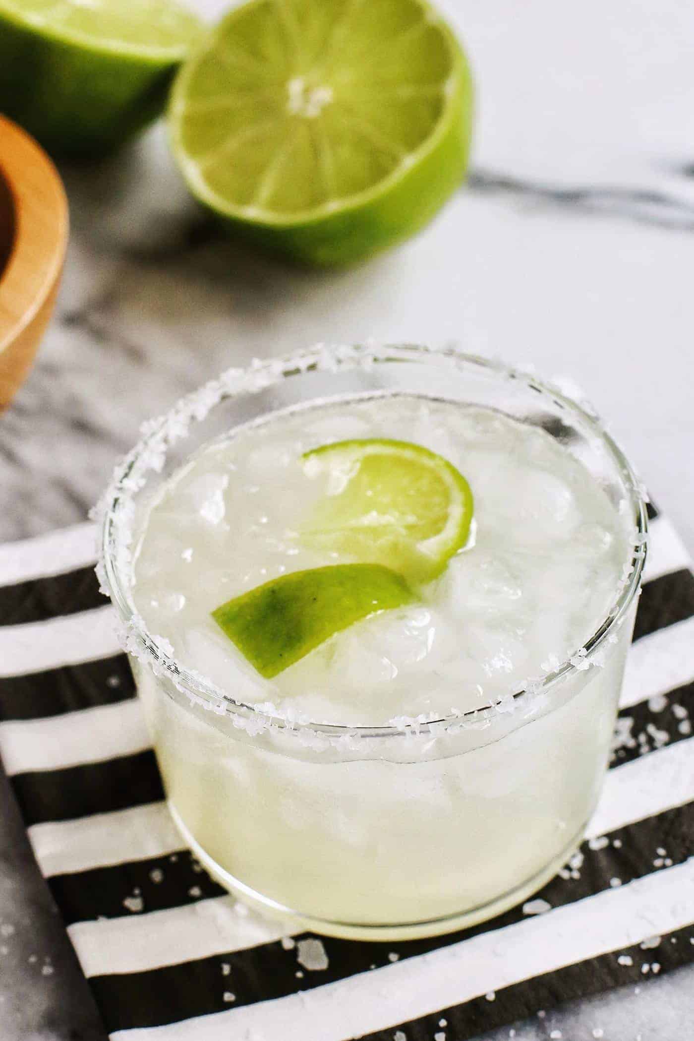 classic margarita cocktail in a salt rimmed glass