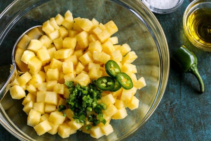 pineapple and jalapeno in a bowl