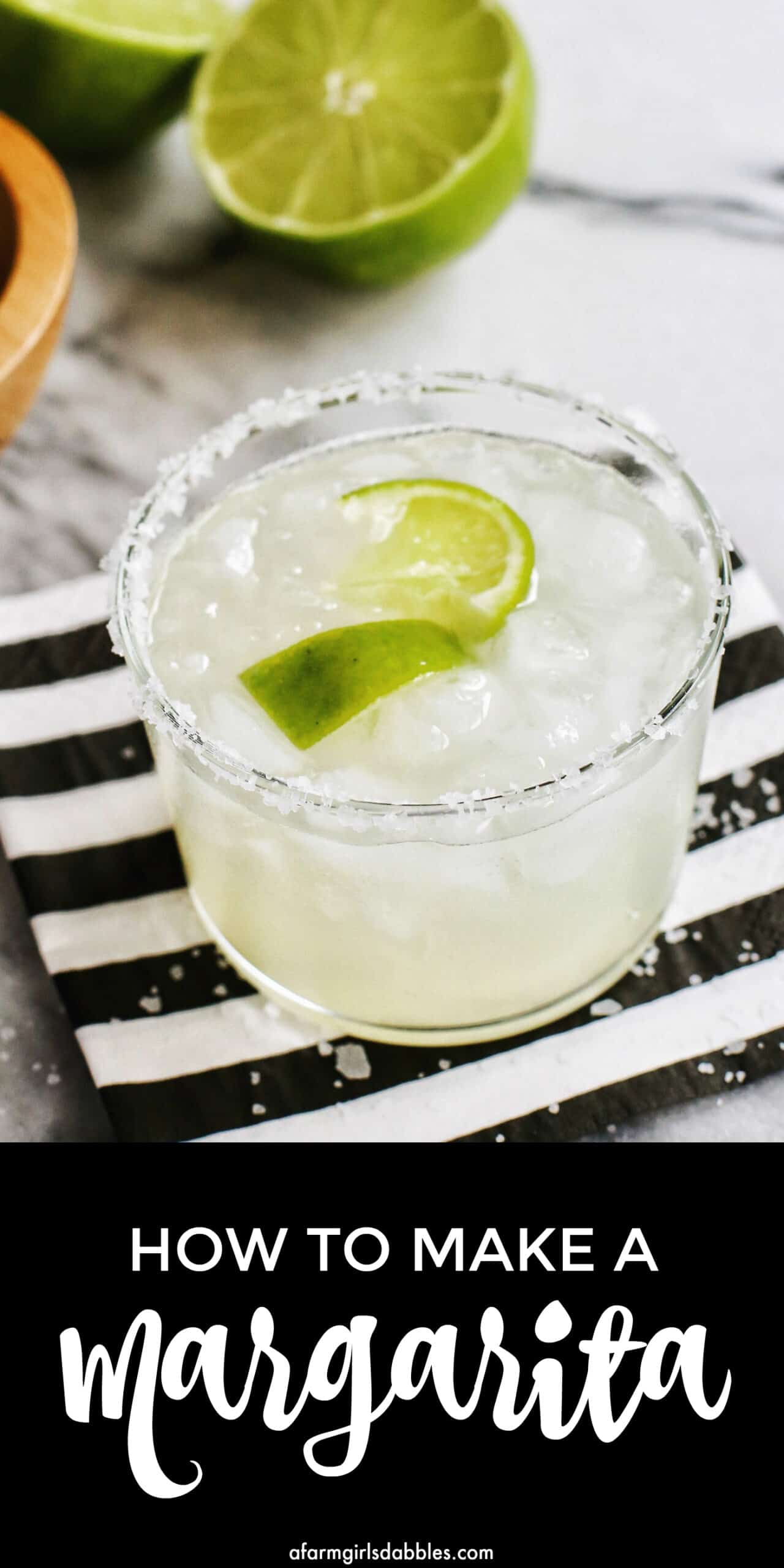 pinterest image of traditional margarita in a salt rimmed glass