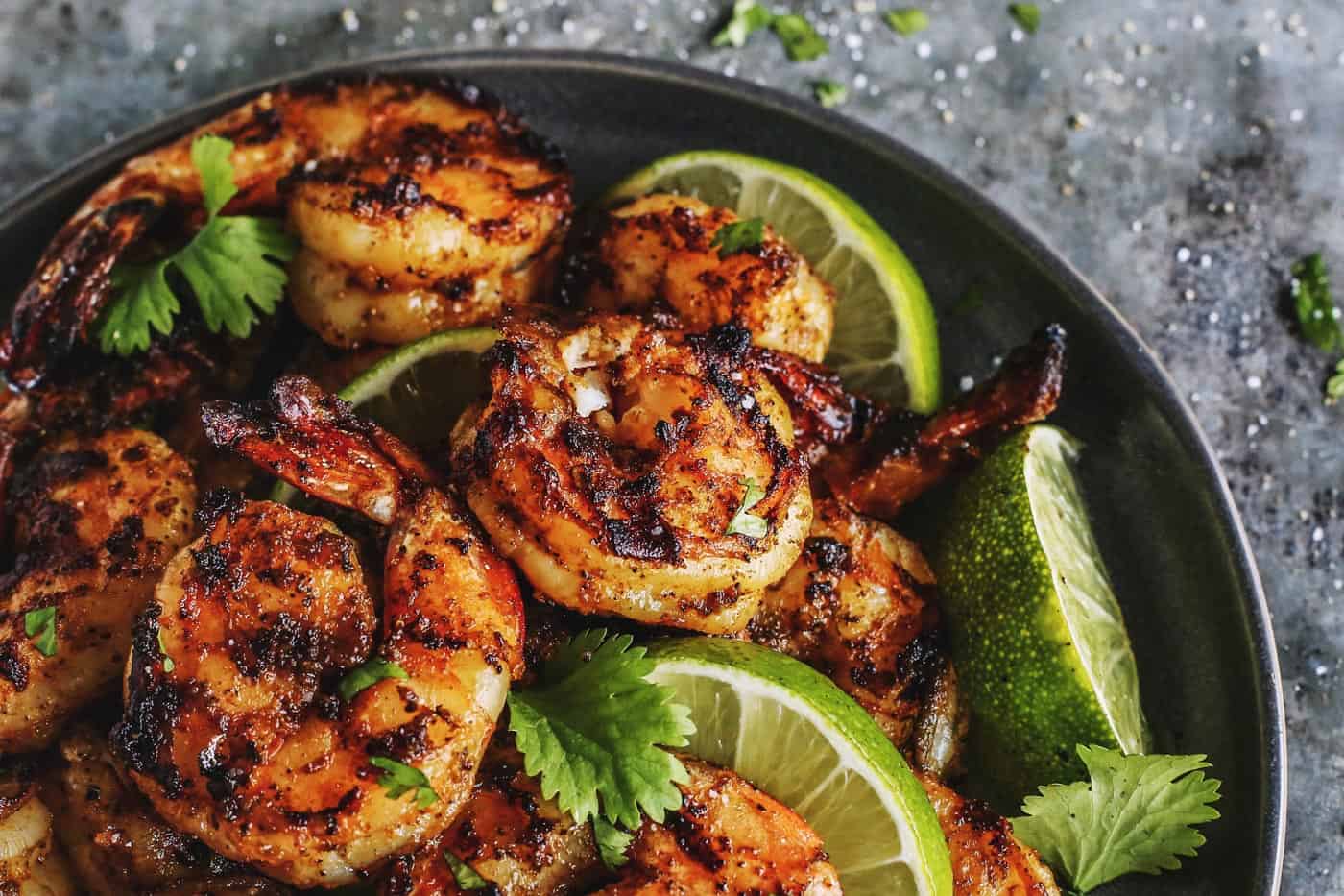 Grilled shrimp with charred grill lines.