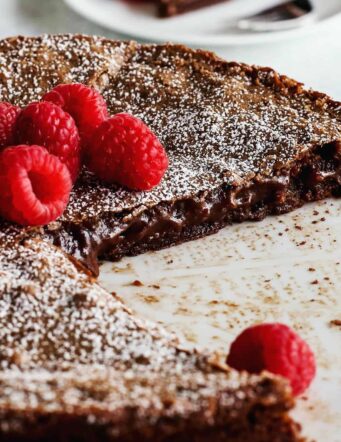 Swedish chocolate cake cut to reveal gooey, sticky interior.