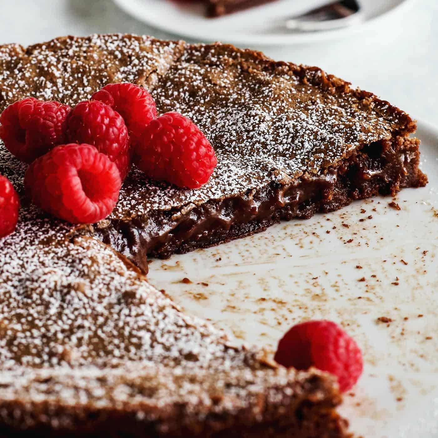 Swedish chocolate cake cut to reveal gooey, sticky interior.