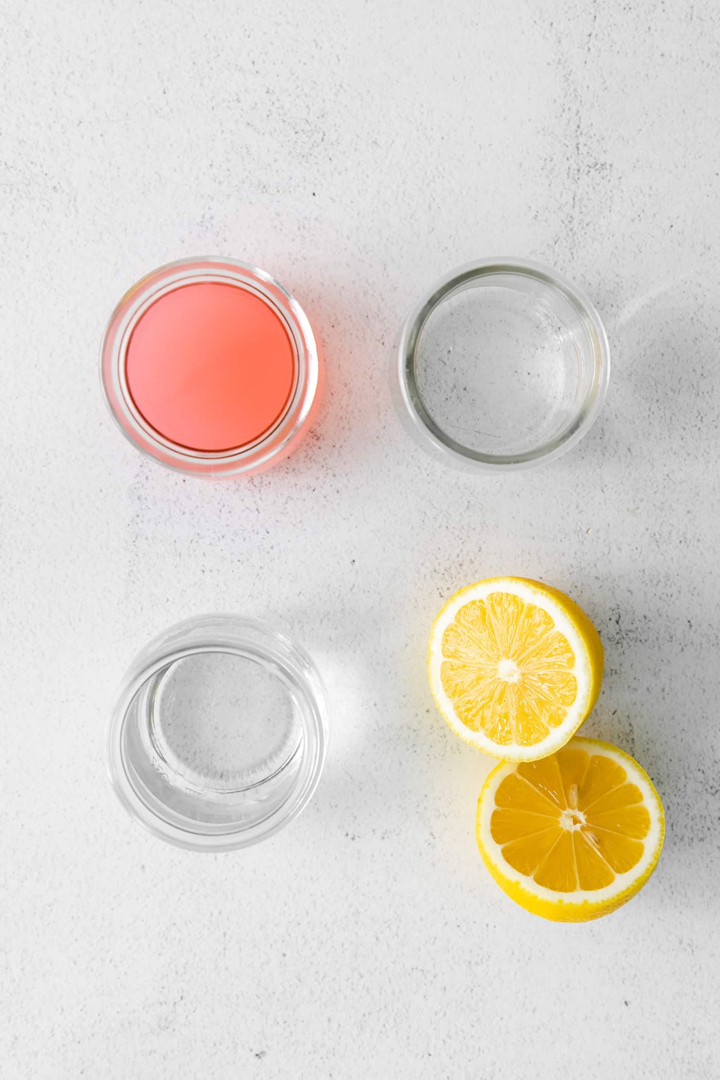 Overhead view of pink lemonade margarita ingredients