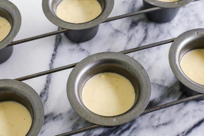 a popover pan filled with batter