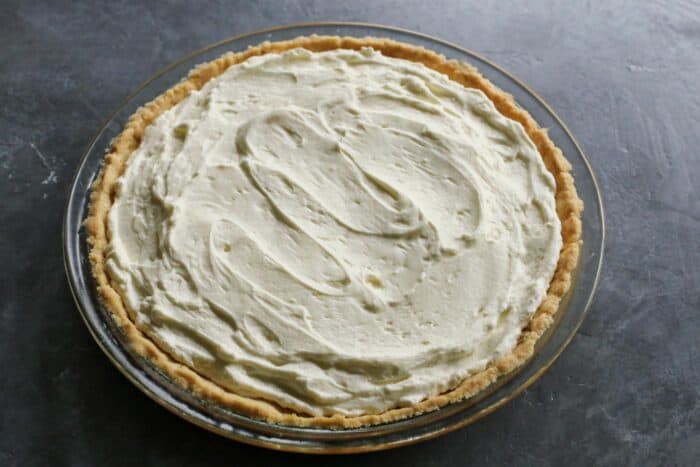 whippy cream cheese layer spread in baked pie crust