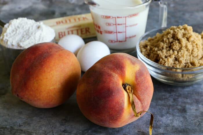 fresh peaches, flour, eggs, butter, buttermilk, and brown sugar