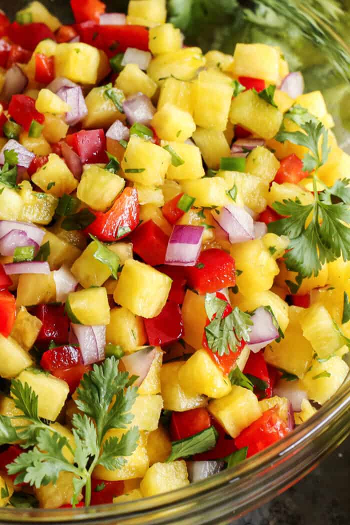 fresh salsa with pineapple, red bell pepper, red onion, and cilantro